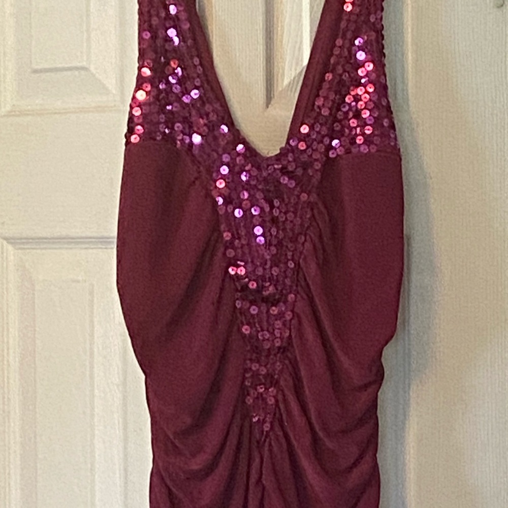 A sparkling top with a deep V neck line.